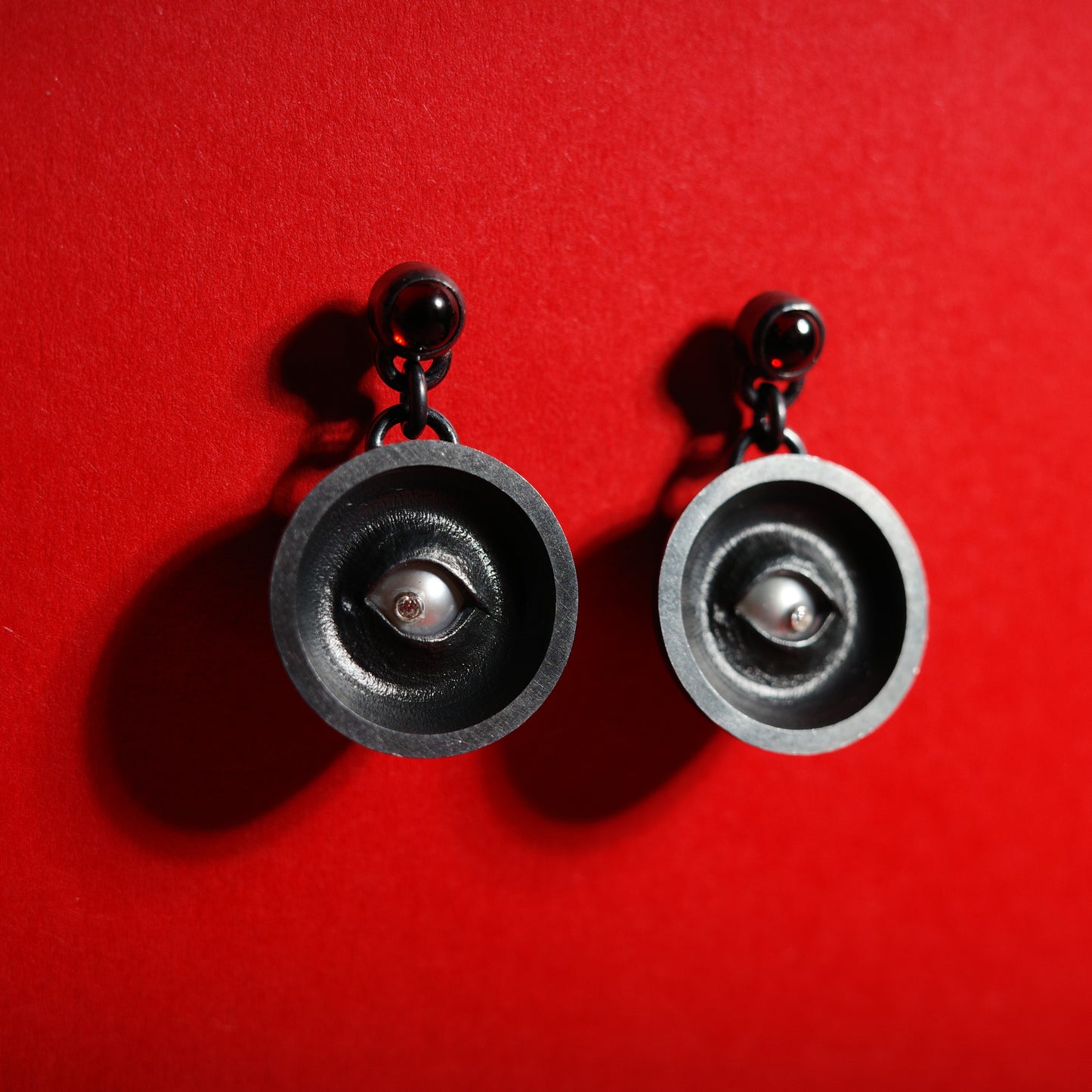 ROLLED-BACK EYE EARRINGS